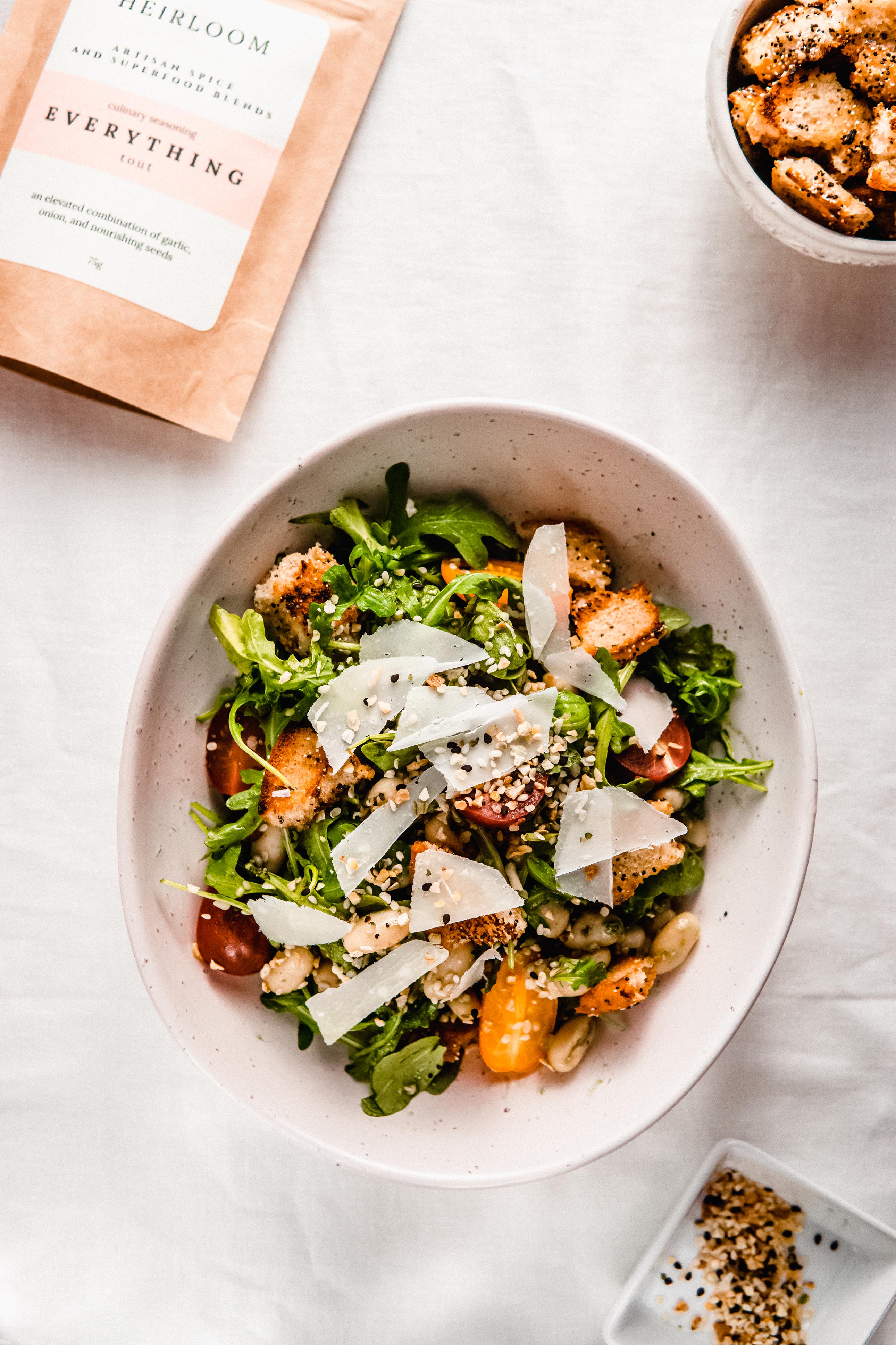 Arugula & White Bean Salad with Everything Bagel Croutons